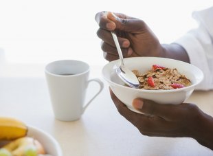 man eating cereal